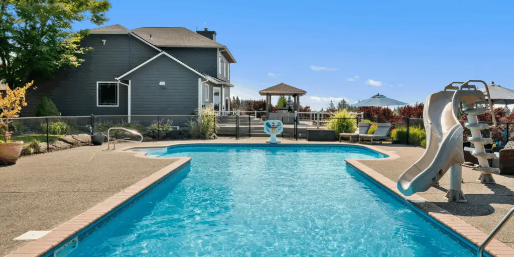 6 Reasons You Need a Fence and Drainage Around a Pool