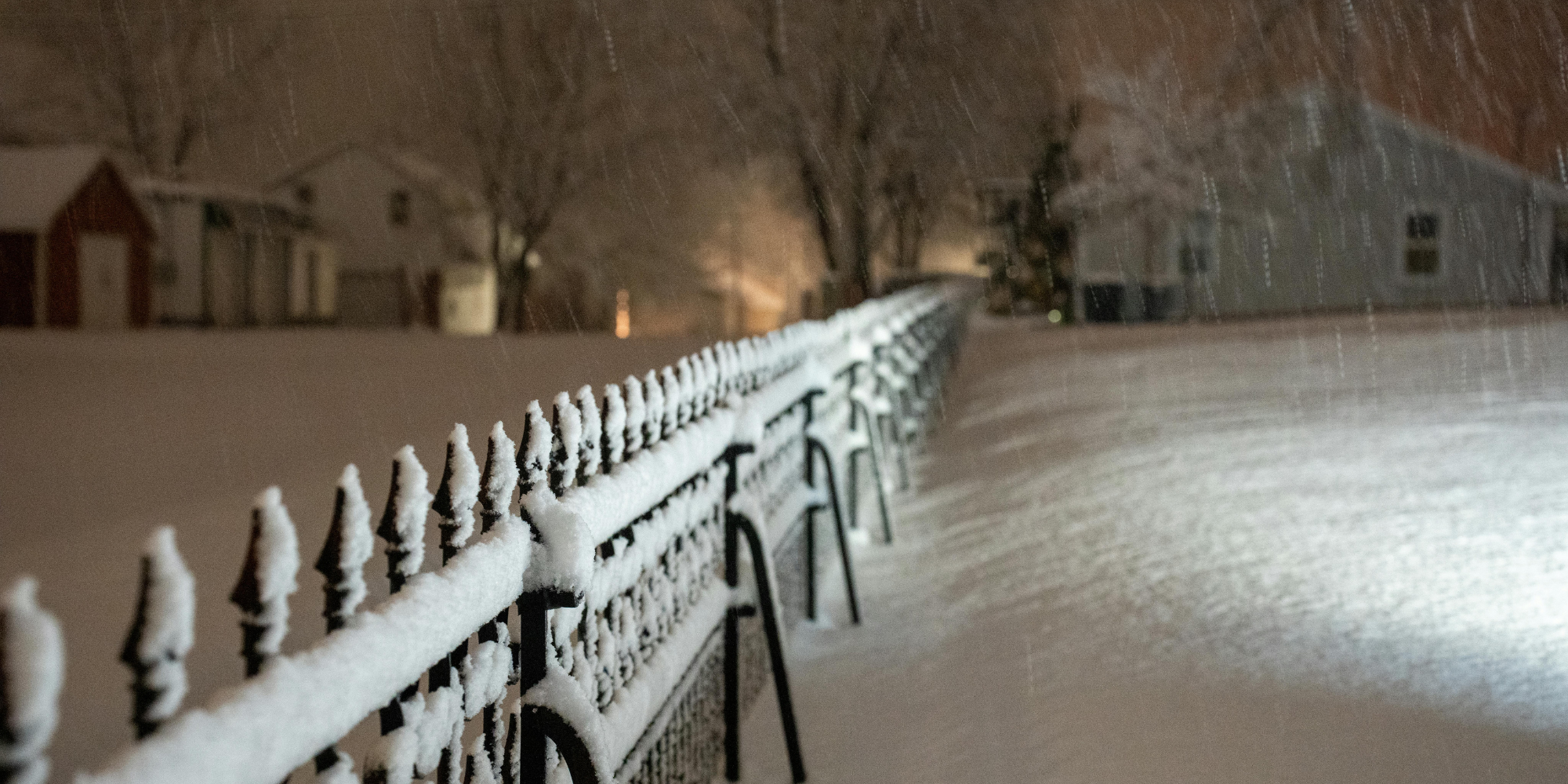 Avoid piling snow against the fence